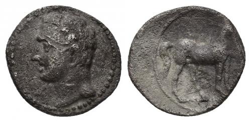 3007 - HISPANIA ANTIGUA. EMISIONES HISPANO-CARTAGINESAS. 1/4 shekel. A/ Cabeza masculina a izq. R/ Caballo parado a der. AR 1,6 g. 12,5 mm. I-545. ACIP-605. Rev. algo descentrado. MBC.