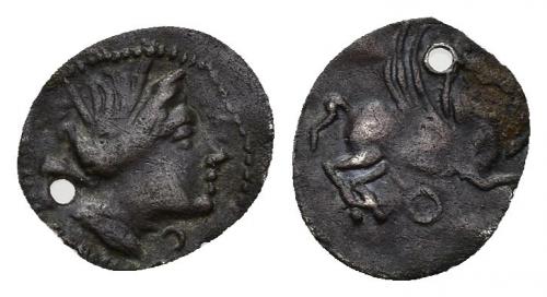 3030 - HISPANIA ANTIGUA. Divisores de imitación emporitana. Hemióbolo. A/ Cabeza femenina a der., delante creciente. R/ Pegaso volando a der., debajo círculo. AR 0,20 g. 10,2 mm. ACIP-518. CC-929, mismo ejemplar. Perforada. MBC. Rarísima. Ex colección Cores.