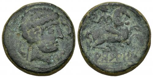 31 - HISPANIA ANTIGUA. ARSAOS. Unidad. A/ Cabeza masculina a der., delante delfín y signos ibéricos ON, detrás arado. R/ Jinete con hacha de guerra a der., debajo sobre línea ARSAOS. AE 13,44 g. 26,2 mm. I-143. ACIP-1649. Pátina verde. MBC-. Rara.