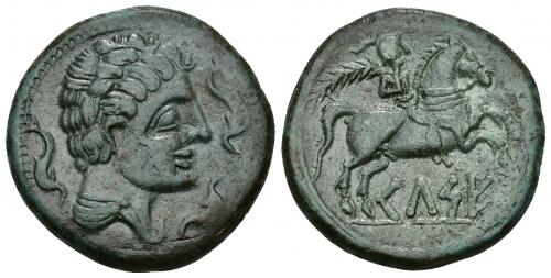 59 - HISPANIA ANTIGUA. KELSE. Unidad. A/ Cabeza masculina con cuello vestido a der., alrededor tres delfines. R/ Jinete con palma a der., debajo sobre línea KeLSE. AE 16,99 g. 31,2 mm. I-771. ACIP-1483. Bonita pátina verde. MBC.