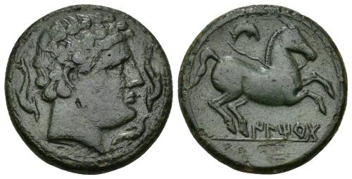89 - HISPANIA ANTIGUA. ILTIRTA. Semis. A/ Cabeza masculina a der., alrededor tres delfines. R/ Caballo galopando con rienda suelta a der., encima creciente, debajo sobre línea ILTiRTa. AE 11,88 g. 24,9 mm. I-1462. ACIP-1237. Pátina verde oscuro. MBC/MBC+. Rara.