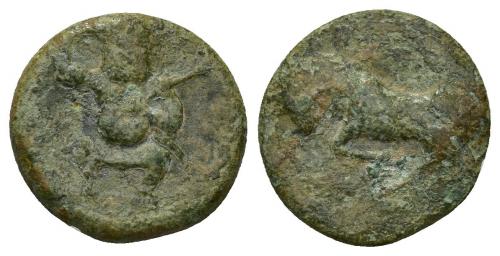 42 - HISPANIA ANTIGUA. EBUSUS. Cuarto. A/ Bes. R/ Toro corriendo a izq. AE 2,3 g. 15,3 mm. I-923. ACIP-704. Pátina verde. RC.
