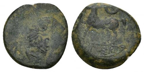 59 - HISPANIA ANTIGUA. IKALKUSKEN. Mitad. A/ Cabeza masculina a der., delante S? y detrás delfín. R/ Caballo al paso a izq., encima creciente, bajo línea IKaLKuSKeN. AE 5,44 g. 19,5 mm. I-1401. ACIP-2080. Pátina verde oscuro. BC-/BC+. Rara.