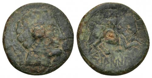 93 - HISPANIA ANTIGUA. METUAINUM. Unidad. A/ Cabeza masculina a der. entre dos delfines. R/ Jinete lancero a der., debajo leyenda ibérica METuAINUM. AE 8,53 g. 24,25 mm. I-1749. ACIP-1861. Perforación en el centro. Pátina verde. BC/BC+. Rara.