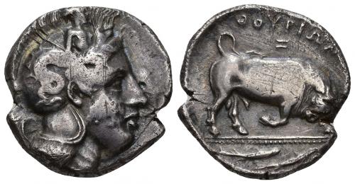 20 - GRECIA ANTIGUA. LUCANIA. THORION. Distátera (s. IV a.C.). A/ Cabeza de Atenea a der. con casco decorado con Escila. R/ Toro embistiendo a der., encima QOURIWN y I, en exergo pez. AR 15,65 g. COP-1429. SBG-446 vte. Cospel abierto. Vanos y rayas. MBC-. Ex subasta Ibergold, Madrid (25-2-1988).