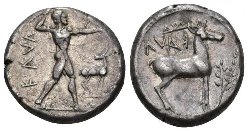 21 - GRECIA ANTIGUA. BRUTTIUM. CAULONIA. Estátera (480-388 a.C.). A/ Apolo a der. con rama y figura, delante ciervo, KALA. R/ Ciervo a der., delante rama de laurel, encima KALA retrógrada. AR 7,80 g. 18,9 mm. COP-1710. SBG-462 vte. Pequeñas marcas. MBC+. Ex subasta Jesús Vico 126 (9-6-2001), lote 194.
