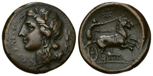 27 - GRECIA ANTIGUA. SICILIA. SIRACUSA. AE-24. Hicetas (288-279 a.C.). A/ Cabeza de Perséfone a izq., detrás espiga de trigo, delante SURAKOSIWN. R/ Biga a der., encima estrella. AE 10,15 g. 24,4 mm. COP-802 vte. SBG-no. MBC+.