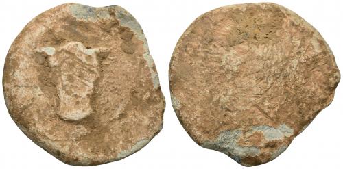 206   -  HISPANIA ANTIGUA. Plomo monetiforme. Serie de las minas. A/ Cabeza frontal de toro. R/ Frustro. Pb 61,16 g. 48,6 mm. CCP-anv. sim. a pp. 28-29. BC-/MC.