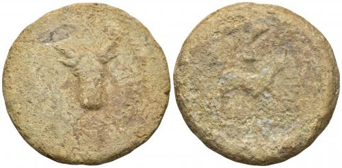 207   -  HISPANIA ANTIGUA. Plomo monetiforme. Serie de las minas. A/ Cabeza frontal de toro, alrededor láurea. R/ Toro a der. Pb 118,05 g. 50 mm. CCP-anv. sim. a p. 28. BC-/RC.