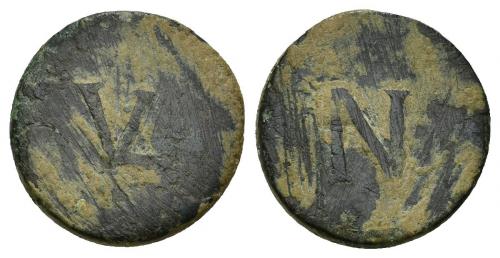 300   -  IMPERIO ROMANO. Tésera. ¿S. I d.C.? A/ VL en monograma. R/ N. AE 2,61 g. 15,9 mm. COH-VIII.62. Rayas. BC+. 