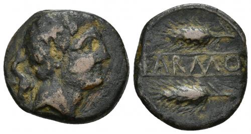 36 - HISPANIA ANTIGUA. CARMO. As. A/ Cabeza masculina a der. R/ Dos espigas a izq., en medio entre líneas KARMO. AE 10,26 g. 22,9 mm. I-463. ACIP-2402. Rayitas. Pátina oscura. MBC-. Rarísima.
