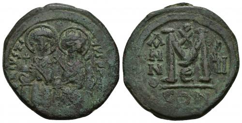 469   -  IMPERIO BIZANTINO. JUSTINO II. Follis. Constantinopolis. R/ Crismón sobre la M, año ÇII(?), oficina E. AE 14,95 g. 31,8 mm. SBB-360. Pátina verde. MBC-. 