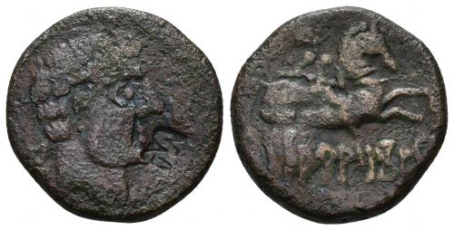 9 - HISPANIA ANTIGUA. ARATIKOS. A/ Cabeza masculina a der., delante creciente, detrás signo ibérico A. Contramarca signo ibérico M delante de la barbilla. R/ Jinete con espada a der., debajo sobre línea ARATiKoS. AE 8,36 g. 22,8 mm. CNH-1. ACIP-1805. CC-2155, mismo ejemplar. BC+. Rara.