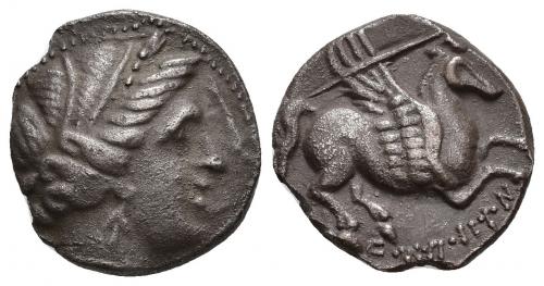 43 - HISPANIA ANTIGUA. DRACMAS DE IMITACIÓN EMPORITANA. Dracma. A/ Cabeza femenina con tocado vegetal a der., alrededor delfines. R/ Pegaso volando a der., debajo ley. griega incorrecta. AR 4,64 g. 18 mm. I-no. ACIP-289 vte. CC-833, mismo ejemplar. Pequeñas roturas al borde. MBC+.