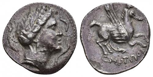 44 - HISPANIA ANTIGUA. DRACMAS DE IMITACIÓN EMPORITANA. Dracma. A/ Cabeza femenina con tocado vegetal a der., alrededor delfines. R/ Pegaso volando a der., debajo ley. griega incorrecta. AR 4,64 g. 20 mm. I-no. ACIP-291 vte. CC-837, mismo ejemplar. MBC+.