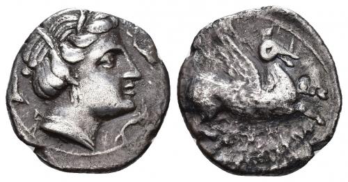 45 - HISPANIA ANTIGUA. DRACMAS DE IMITACIÓN EMPORITANA. Dracma. A/ Cabeza femenina con tocado vegetal a der., alrededor 3 delfines. R/ Pegaso con cabeza modificada a der., debajo restos de ley. griega incorrecta. AR 4,35 g. 18,5 mm. I-1138 vte. ACIP-295 vte. MBC/BC+. Rarísima.