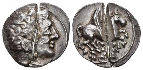 47 - HISPANIA ANTIGUA. DRACMAS DE IMITACIÓN EMPORITANA. Dracma. A/ Cabeza masculina a der. sin delfines. R/ Pegaso con la cabeza modificada a der., debajo lobo y ley. ibérica ILTiRTaR. AR 4,60 g. ACIP-343. CC-844, mismo ejemplar. Partida en dos por corte de cizalla. MBC/MBC+. Rarísima.