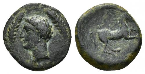 2018 - COLECCIÓN CORES. SICILIA-CARTAGO (Mediados s. IV-300 a.C.). A/ Cabeza masculina a izq. entre dos espigas. R/ Caballo suelto a der. AE 1,79 g. 15,5 mm. COP-120; CC-5379, mismo ejemplar. Pátina verde oscuro. MBC. Rarísima.