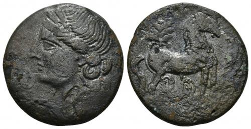 2045 - COLECCIÓN CORES. CARTAGO O CECA ITALIANA (221-202 a.C.). A/ Cabeza de Tanit a izq. R/ Caballo parado a der. delante de palmera, debajo monograma con s y t. AE 11,83 g. 24 mm. COP-341-343; CC-5455, mismo ejemplar. Pátina oscura con erosiones. MBC+/MBC.