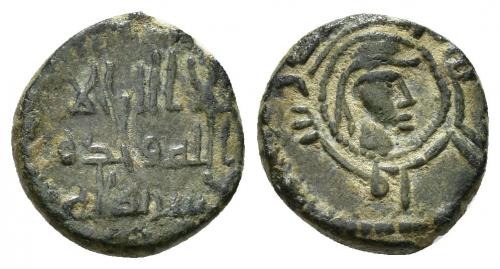 21 - CONQUISTA/GOBERNADORES. Felús. Sin ceca. Sin fecha. A/.لا الـه الا \ الله وحـده \ لاشركله . R/Cabeza con casco a der.; en orla محمد رسول الله. CU 1,88 g. 14 mm. F-XIV-a. MBC+/MBC.