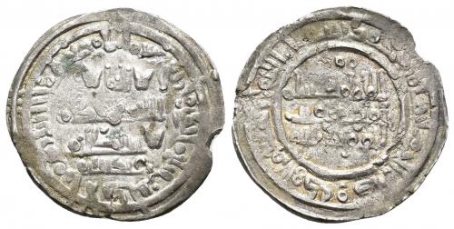 335   -  CALIFATO. HISAM II (977-1008). 2º reinado (400-403). Dírham. Al-Andalus. 401 H. AR 3,09 g. 23 mm. V-701; PV-12b. Pequeñas marcas al borde. R.B.O. MBC.