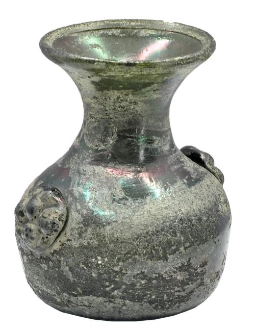ÁRABE-BIZANTINO. V-VIII d.C. Vidrio verde. Botella con fals