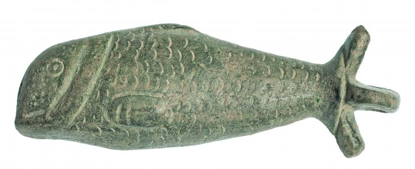 710   -  ROMA. Dominación romana en Egipto. Bronce. Colgante en forma de Lepidotes (?). Longitud: 7,7 cm. Procedente de colección privada española años 1970-80.