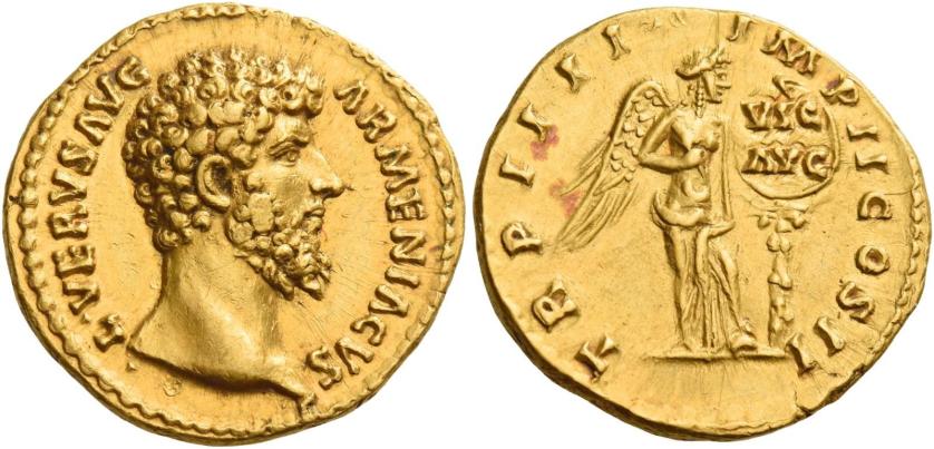 124   -  LUCIUS VERUS. Aureus. AV 7.26 g. ·L·VERVS AVG – ARMENIACVS Bare head r. Rev. TR P IIII – IMP II COS II Victory, half-draped, standing r., placing a shield inscribed VIC / AVG on a palm tree.  Minor area of weakess on obverse and unobtrusive marks, otherwise extremely fine / good extremely fine.