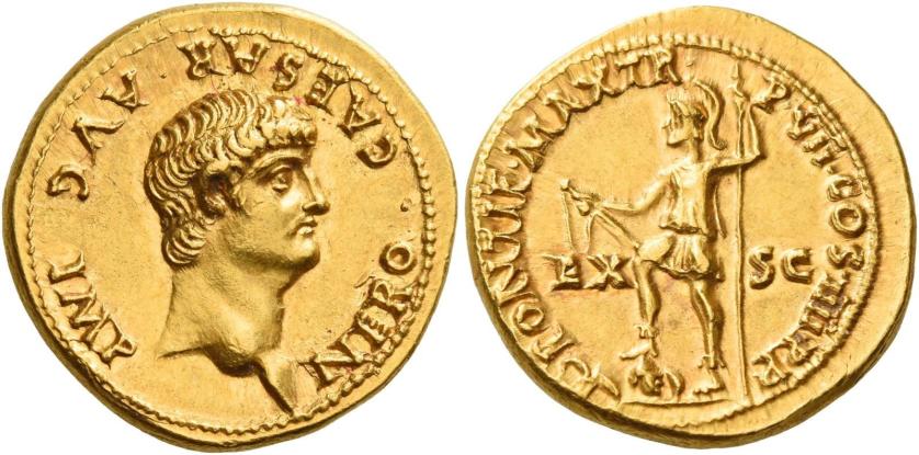 16   -  NERO CAESAR. Aureus. AV 7.32 g. NERO CAESAR·AVG IMP Bare head r. Rev. PONTIF MAX TR – P VII COS IIII P·P Virtus, helmeted and in military attire, standing l., holding parazonium and sceptre; r. foot on pile of arms; at his sides, EX – SC. Rare. Struck in high relief on a very broad flan. Virtually as struck and almost Fdc.