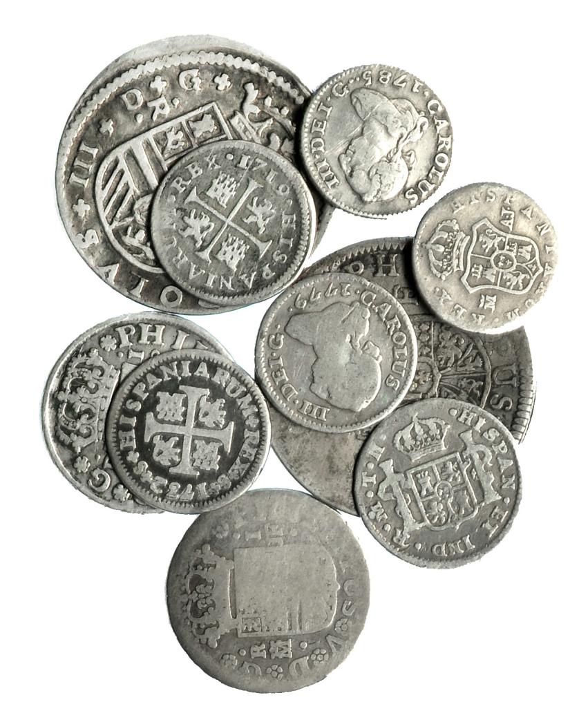 302   -  Lote 10 piezas: 1/2 real (6), 1 real (2) y 2 reales (2). Felipe V (5), Carlos el Pretendiente (I), Carlos III (2), Carlos IV (1) y Fernando VII (1). BC+/MBC-.