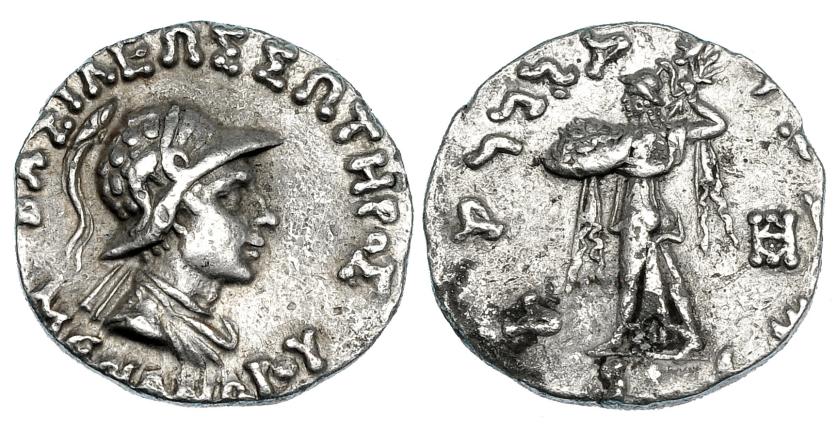 87   -  BACTRIA. Menandro I. Dracma (165-130). A/ Busto acorazado y drapeado con casco a der.; alr. ley. griega BASILEWS SWTEROS MENANDROU. R/ Atenea a izq. con escudo y haz de rayos, detrás monograma; ley. karoshti. AR 2,43 g. SBG-7597. MBC.