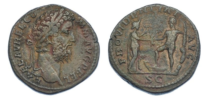 386   -  CÓMODO. Sestercio. Roma (192). R/ Hércules con pie sobre proa saludando a África con león a sus pies; PROVDENTIAE AVG, exergo SC. RIC-641. MBC-/BC+. Escasa.