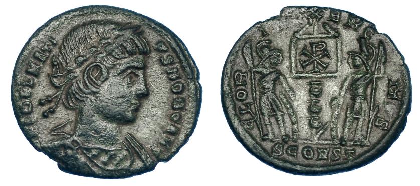 3104   -  DELMACIO. Follis. Arelate (336). R/ GLORIA EXERCITUS, crismón; exergo SCONST. RIC-398. Pátina verde. MBC.