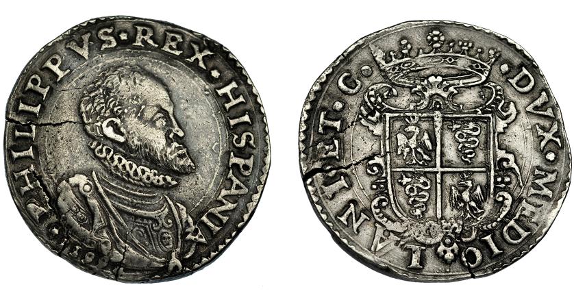 454   -  FELIPE II. Escudo de plata. 1599. Milán. Acuñación póstuma. Olivares-55. CR-17D. Finas grietas. MBC/MBC+. Escasa.