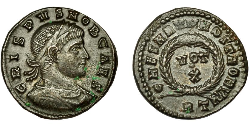 263   -  CRISPO. Follis. Roma (321). R/ Corona rodeando VOT/./X; CAESARVM NOSTRORVM. AE 2,97 g. 19 mm. RIC-238. EBC-.