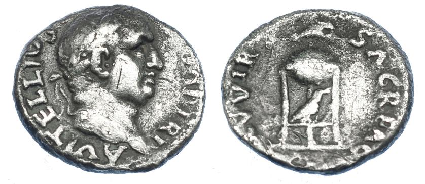 2195   -  IMPERIO ROMANO. VITELIO. Denario. Roma (69 d.C.). A/ Cabeza laureada a der. R/ Trípode, encima delfín y cuervo en el interior; XV VIR SACR FAC. AR 2,99 g. 18,0 mm. RIC-109. Rayita en anv. Erosiones. BC+. Escasa.