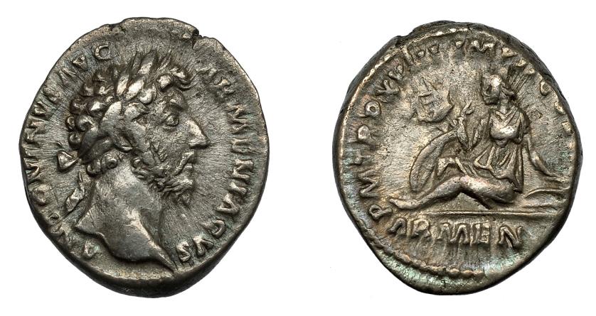 2257   -  IMPERIO ROMANO. MARCO AURELIO. Denario. Roma (164-165). R/ Armenia sentada a izq., detrás escudo y vexillu; P M TR P XVIII IMP II COS III ARMEN. AR 3,42 g. 17,6 mm. RIC-81. MBC.