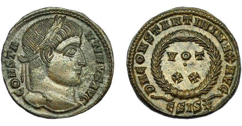 2317   -  IMPERIO ROMANO. CONSTANTINO I. Follis. Siscia (320-321). R/ Corona de laurel rodeando VOT/XX, exergo gamma SIS estrella- AE 2,65 g. 17,9 mm. RIC-159. Leves erosiones. EBC.