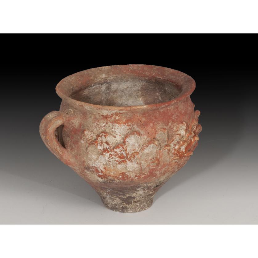 2679   -  ROMA. Imperio Romano. Vaso (II a.C. - I d.C.). Cerámica. Pasta anaranjada con decoración a barbotina de escamas en el cuerpo superior. Altura 9,8 cm.