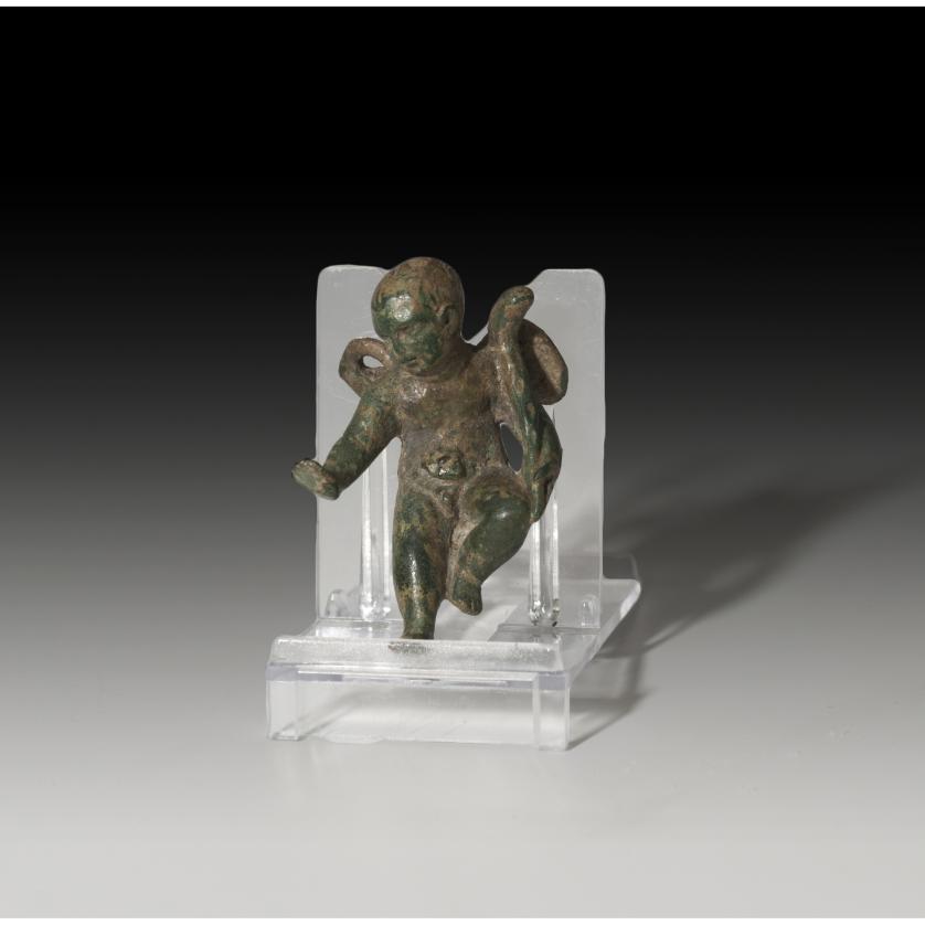 2718   -  ROMA. Imperio Romano. Figura de Cupido (I-II d.C.). Bronce. Altura 5,2 cm.