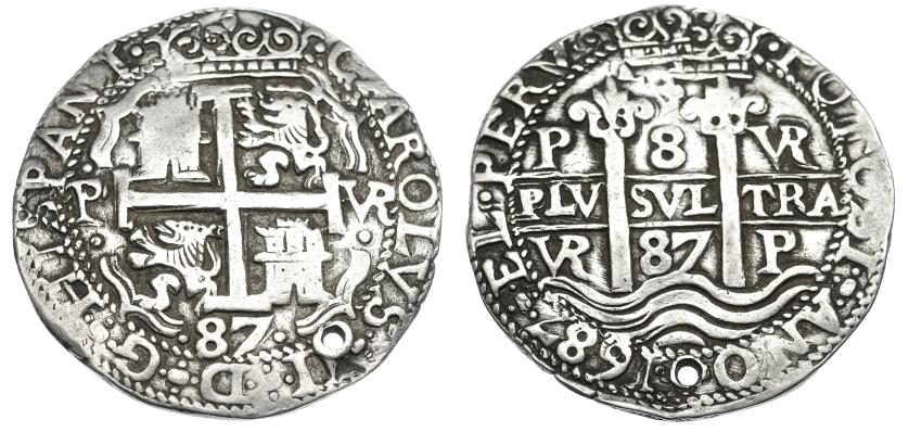 1063   -  CARLOS II. 8 reales. 1687. Potosí. VR. Tipo real. HISPANI al final de la ley. de anv. Lázaro-220 (R2). AR 26,26 g. Agujero. MBC. Rara.