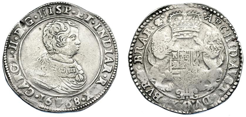 1075   -  CARLOS II. Ducatón. 1668. Amberes. DEL-325. DAV-4475. Cospel ligeramente abierto. MBC-.