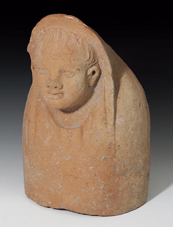2010   -  ETRURIA. Busto votivo de niño (III-II a.C.). Terracota. Altura 29,8 cm. Ex. Bonhams 28 de noviembre de 2019, lote 85.