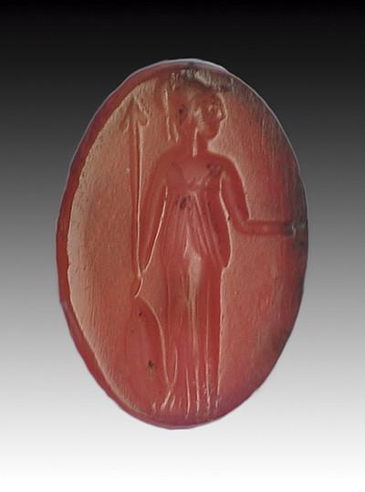 2030   -  ROMA. Imperio Romano. Entalle (II d.C.). Cornalina. Minerva de pie a der. sujetando escudo y lanza. Altura 15 mnm.
