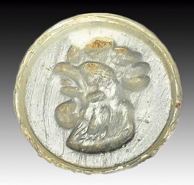 2032   -  ROMA. Imperio Romano. Entalle (I-III d.C.). Calcedonia transparente. Con representación de cabeza de gallo a izquierda. Diámetro 14 mm.