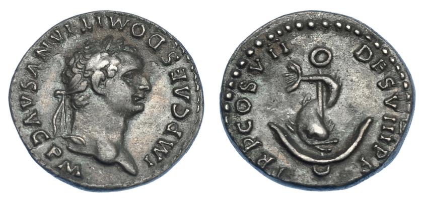 473   -  IMPERIO ROMANO. DOMICIANO. Denario. Roma (81 d.C.). A/ Cabeza laureada a der.; IMP CAES DOMITIANVS AVG P M. R/ Delfín enroscado en ancla; TR P COS VII DES VIII P P. AR 3,36 g. 17,8 mm. RIC-54. Pátina gris. MBC/MBC+. Escasa.