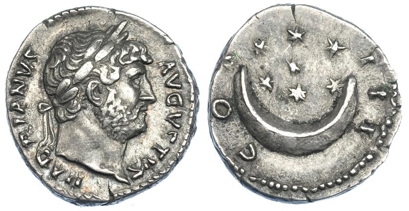 516   -  IMPERIO ROMANO. ADRIANO. Denario. Roma (125-128). A/ Cabeza laureada a der.; HADRIANVS AVGVSTVS. R/ Siete estrellas sobre creciente; COS III. AR 3,46 g. 18,2 mm. RIC-852. MBC+. Escasa.