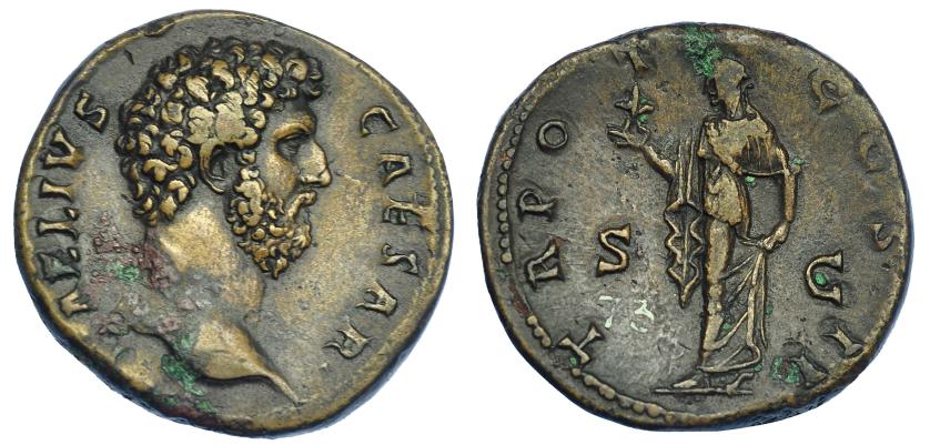 549   -  IMPERIO ROMANO. AELIO. Sestercio. Roma (137). A/ Cabeza desnuda a der.; L AELIVS CAESAR. R/ Spes avanzando a izq. con flor y sujetándose el vestido; TR POT COS II, S C. AE 25,50 g. 31,1 mm. RIC-2695. Concreciones. MBC+/MBC. Rara. Procede de Sevilla. Ex  col. Montera. Tejuelos de colección antigua (1918). 