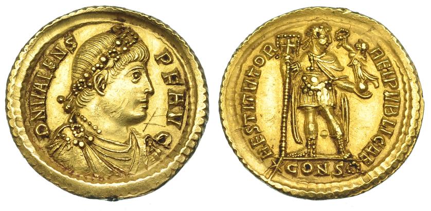 597   -  IMPERIO ROMANO. VALENTE. Sólido. Constantinopla (364-367). R/ El emperador en traje militar, mirando a der., sosteniendo estandarte y Victoria sobre globo; RESTITVTOR REIPVBLICAE, exergo *CONS (láurea). AU 4,39 g. 21,6 mm. RIC-25b. Grafito y golpecito en rev. EBC-. 