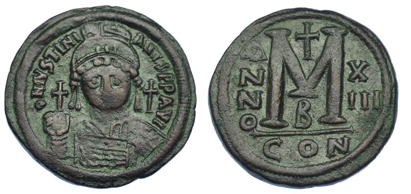 606   -  IMPERIO BIZANTINO. JUSTINIANO. Follis. Constantinopolis. A/ Busto frontal del emperador; año de reinado XIII, oficina B. AE 22.01 g. 38,8 mm. SBB-163. Pátina verde. MBC.